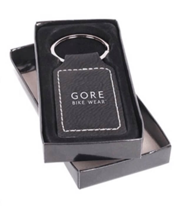 black leather keychain with white stitching